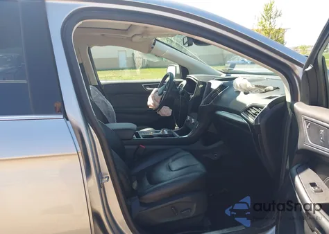 2022 Ford Edge Titanium z USA, uszkodzony, nr VIN 2FMPK4K91NBA97190